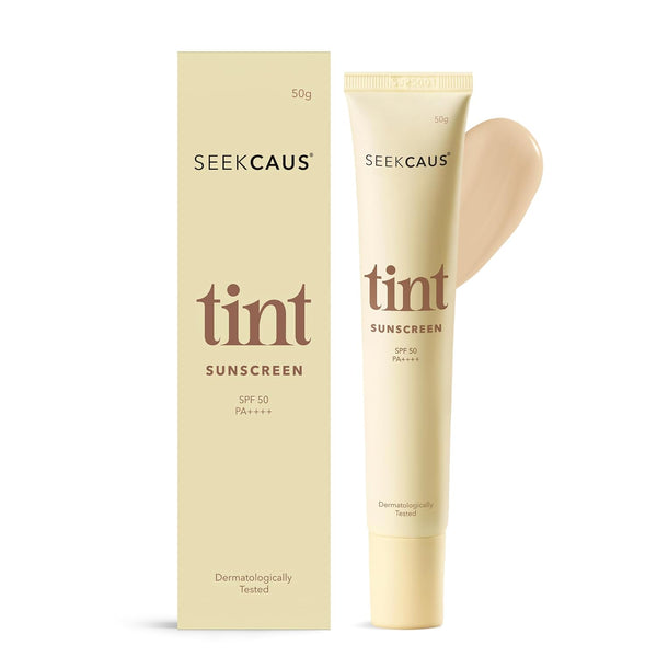 Front view of Seekcaus Tint Sunscreen 50g squeeze tube alongside its outer carton packaging box displaying a cream swipe texture background.